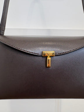 Totême Brown T-Lock Small leather clutch