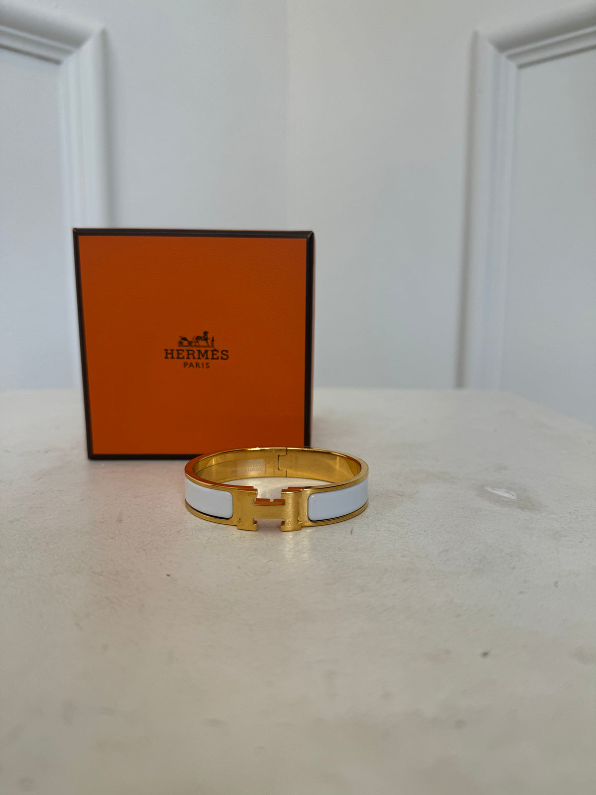 Hermès Gold Tone and White Enamel Clic H bangle