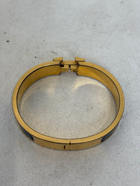 Hermès Black and Gold Clic H Bracelet