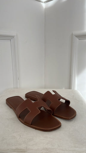 Hermès Gold Oran Sandals, 39
