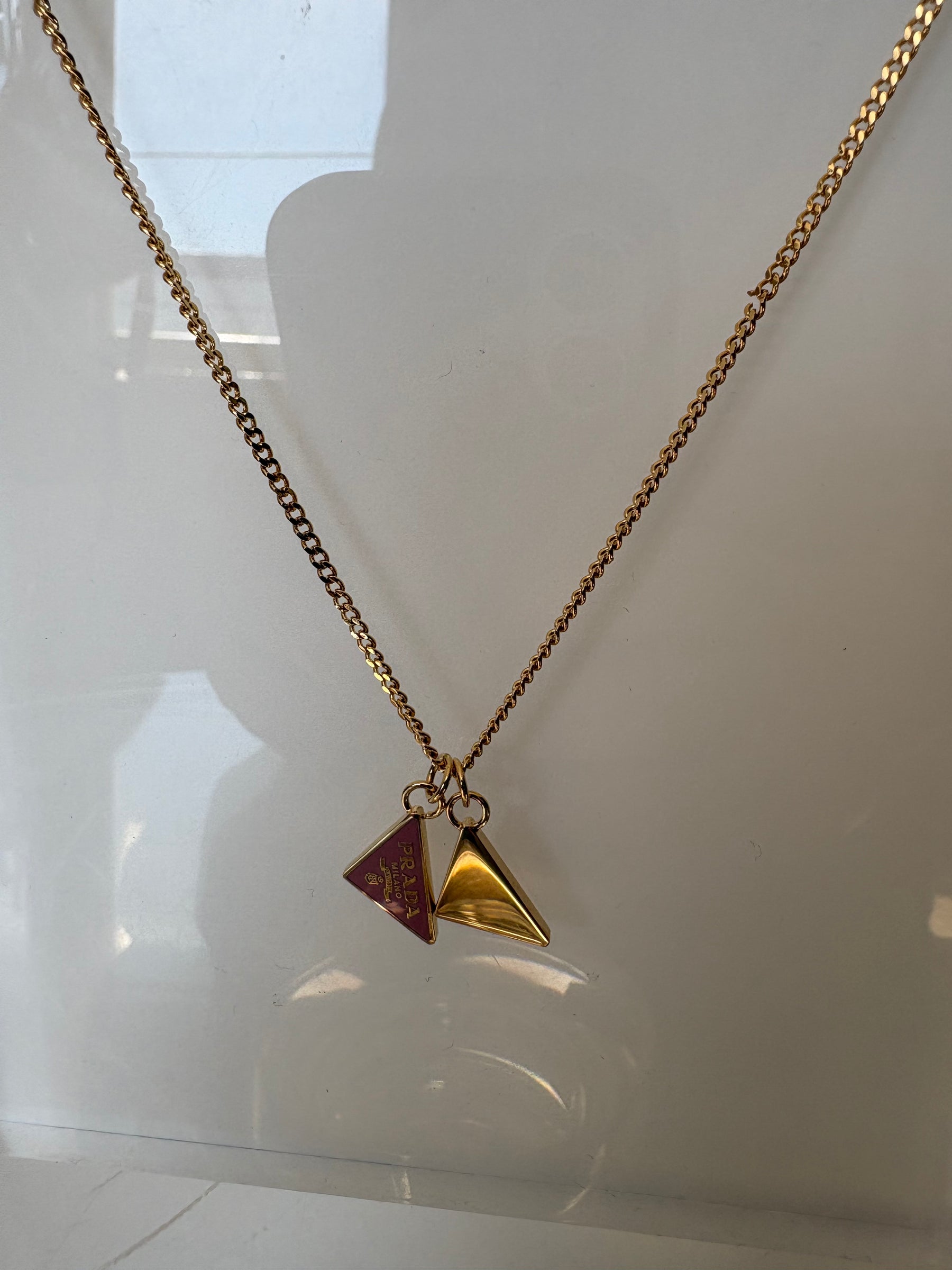 Prada Gold Tone Pink Triangle Logo Necklace