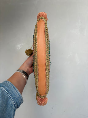 LOEFFLER RANDALL Raffia Clutch With Pom Poms