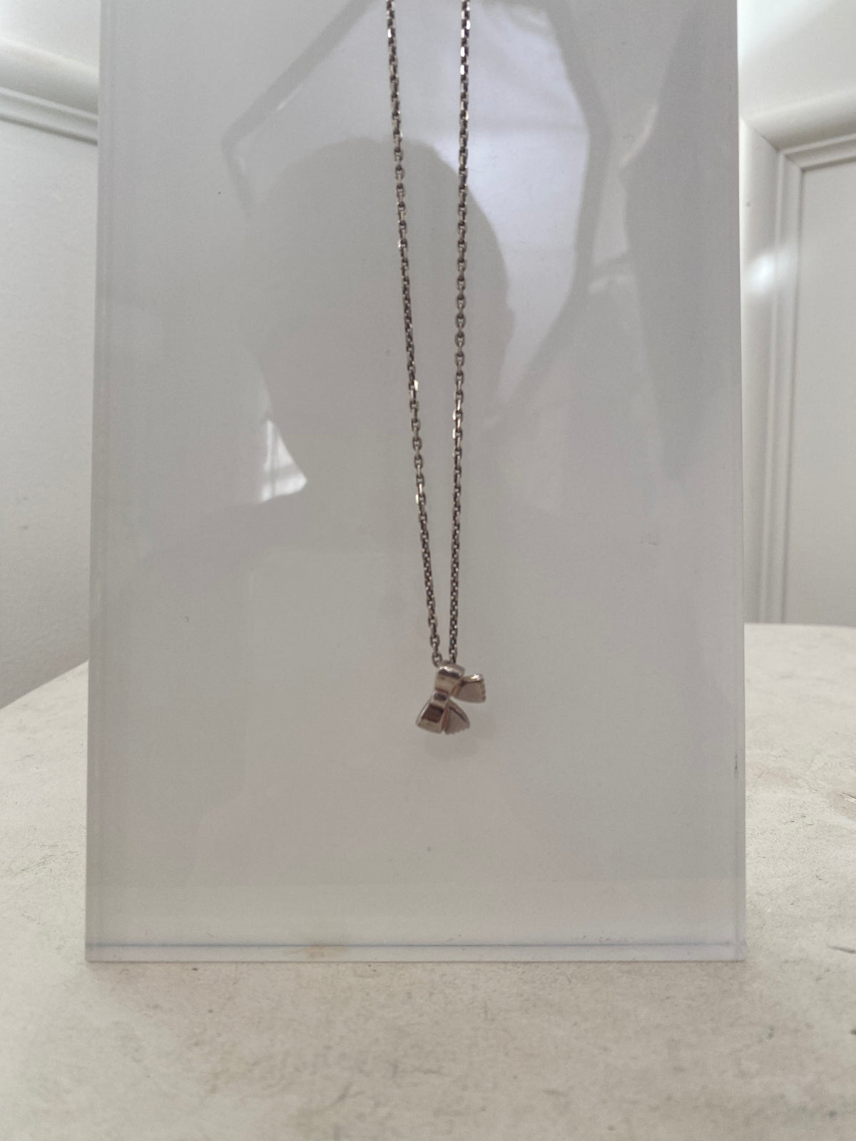 Chanel Silver Bow Pendant Necklace