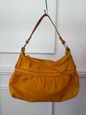 Fendi Orange Perforated Monogram Chef Bag