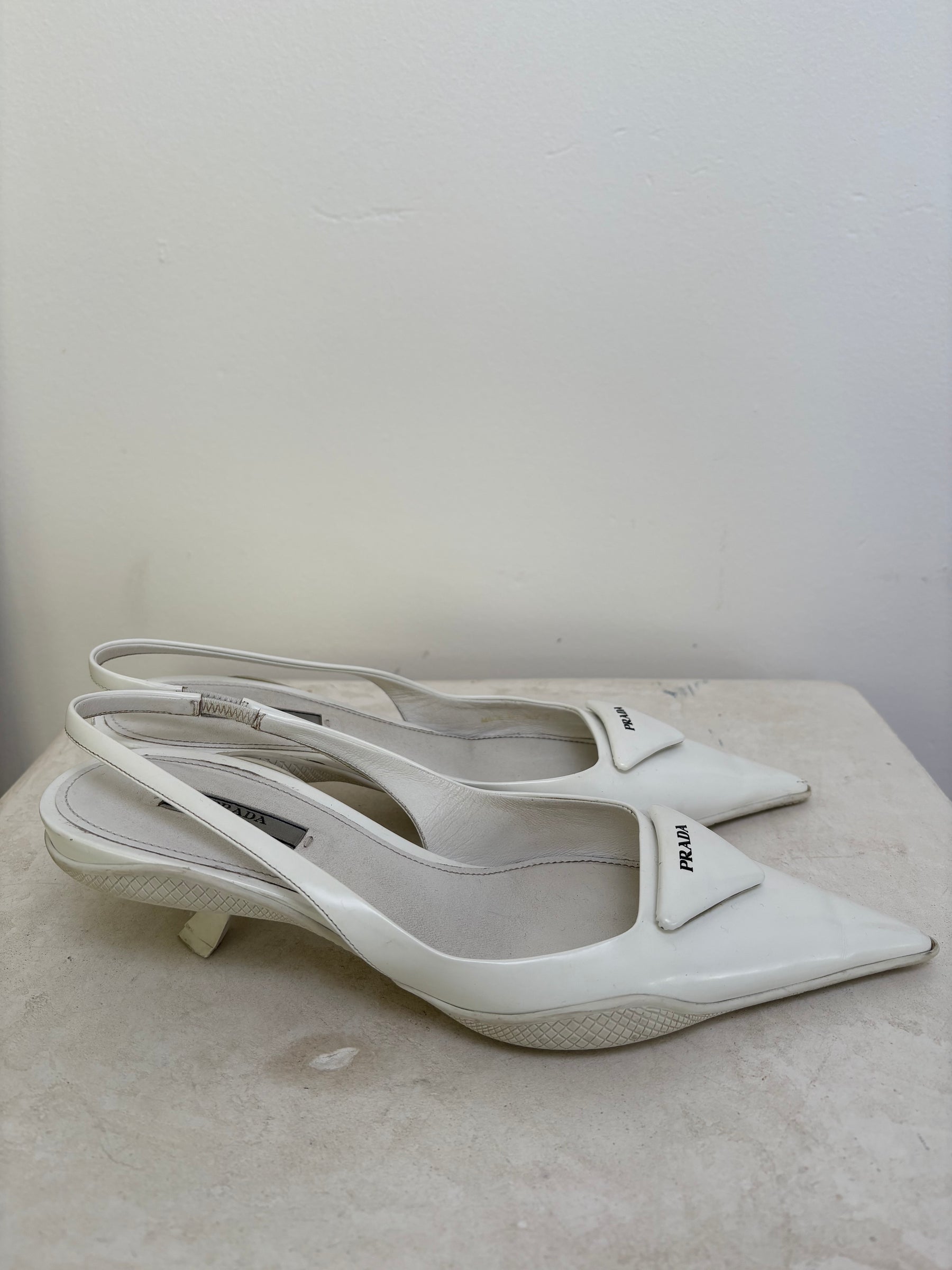 Prada Pointed Slingback Pumps In White, 38