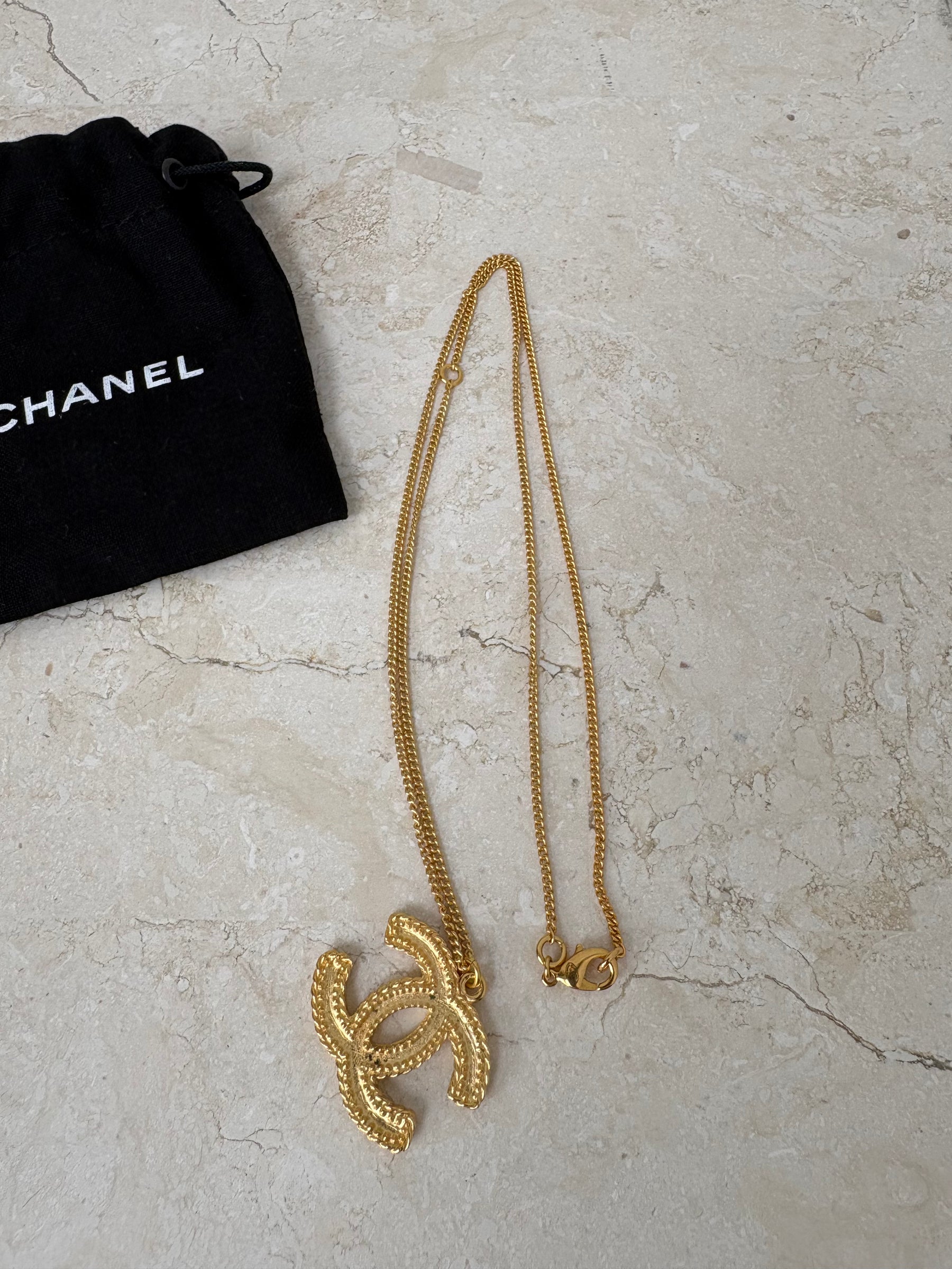 Chanel Gold Tone CC Pendant Necklace