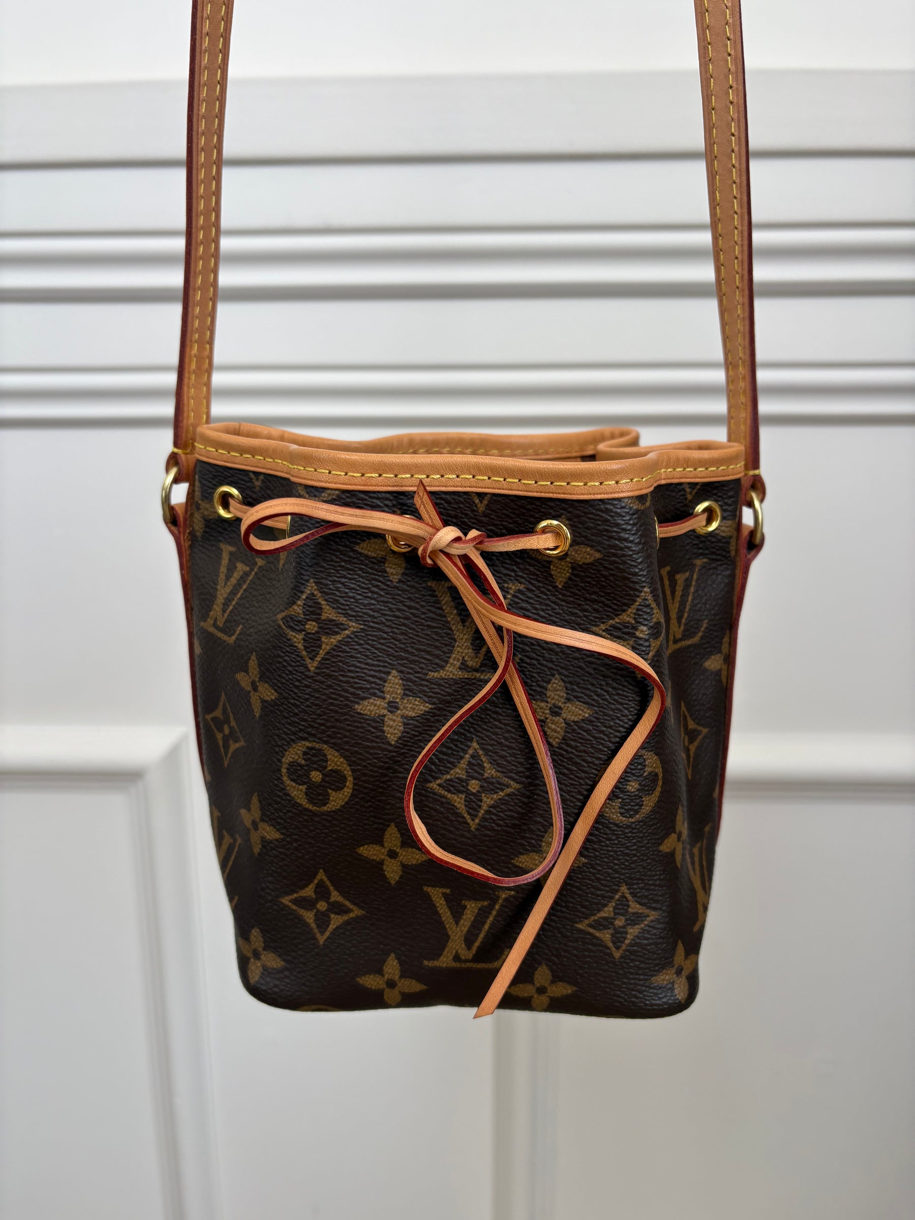 Louis Vuitton Canvas Monogram Mini Drawstring Bucket Bag