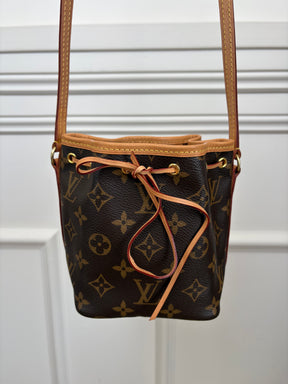 Louis Vuitton Canvas Monogram Mini Drawstring Bucket Bag
