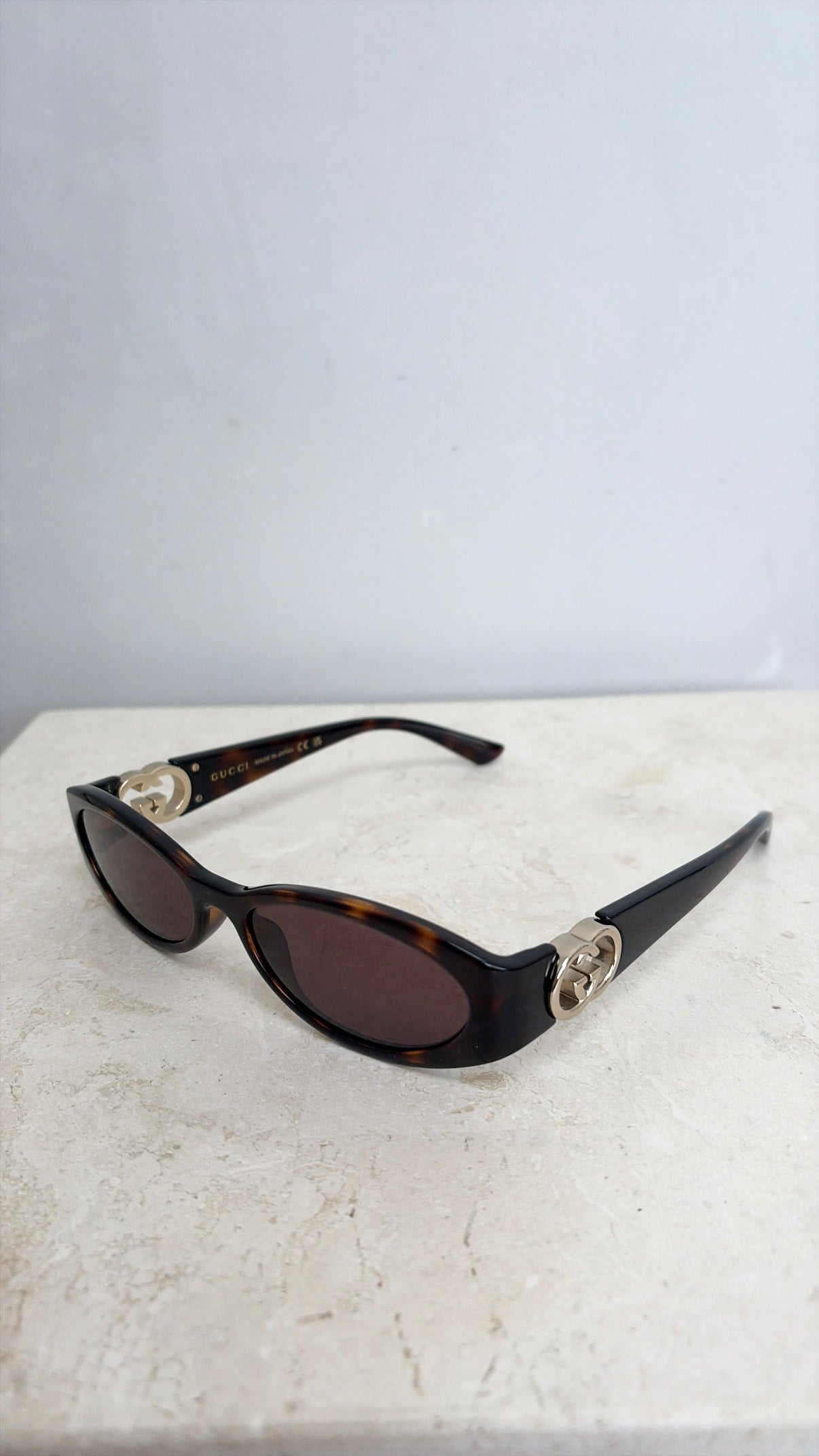 Gucci Tortoiseshell Oval Logo Arm Sunglasses