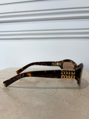 Miu Miu Tortoiseshell Oval Logo Sunglasses