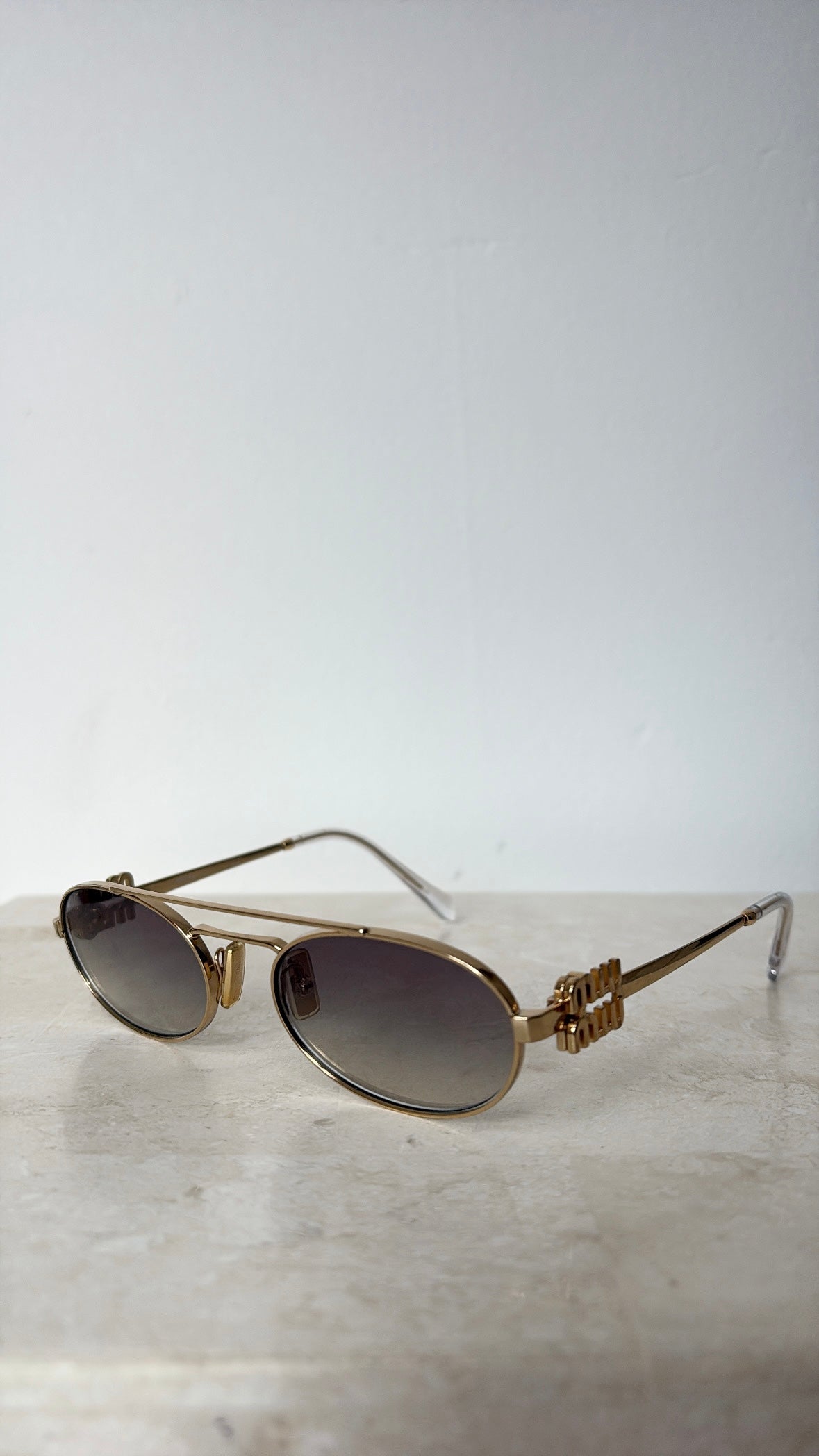 Miu Miu Gold Oval Logo Sunnies