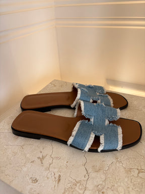 Hermès Blue Frayed Denim Oran Sandals, 38