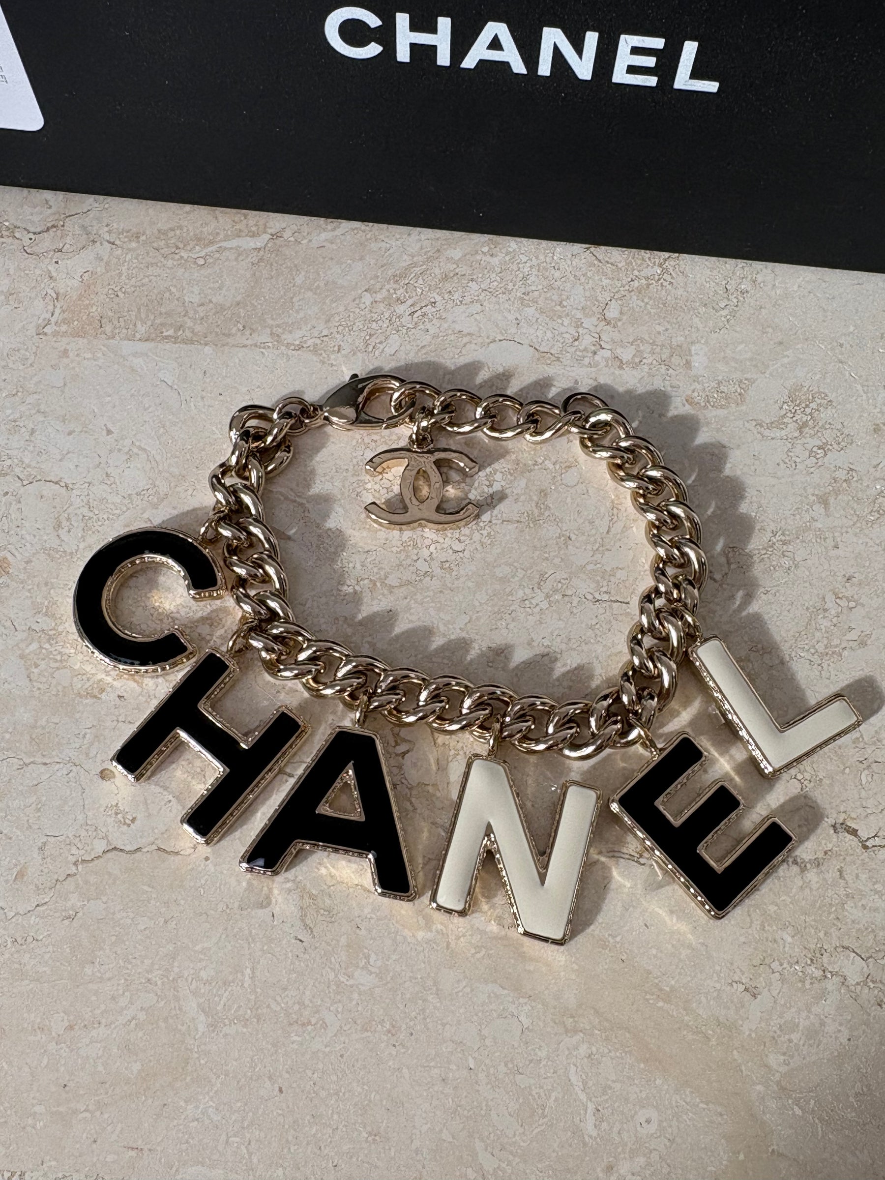 Chanel Silver C H A N E L Charm Bracelet