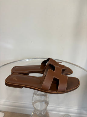 Hermès Gold Leather Oran Sandals, 39