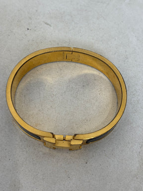 Hermès Black and Gold Clic H Bracelet