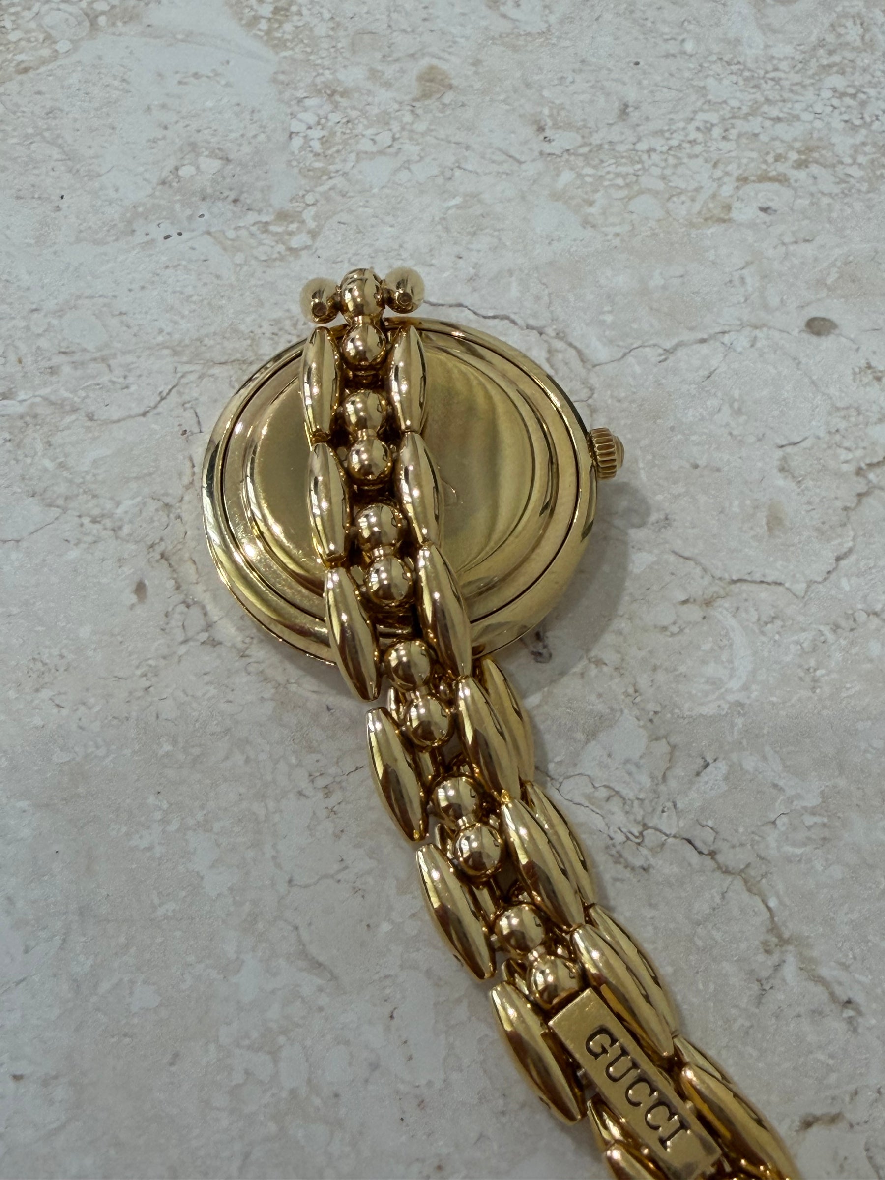 Gucci Gold Tone Interchangeable Bezel Watch