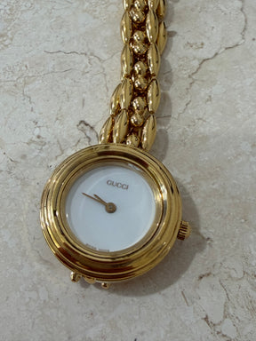 Gucci Gold Tone Interchangeable Bezel Watch