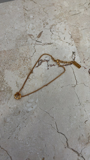 Saint Laurent Gold Tone Logo Charm Bracelet