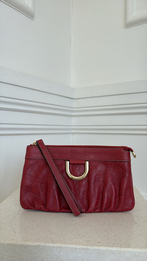 Gucci Red Monogram Embossed leather Wristlet Pouch