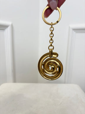 Chanel Gold Tone Spiral Logo Keyring