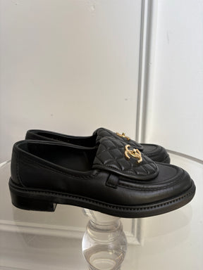 Chanel Black Quilted Leather Turnlock Loafers, 36.5