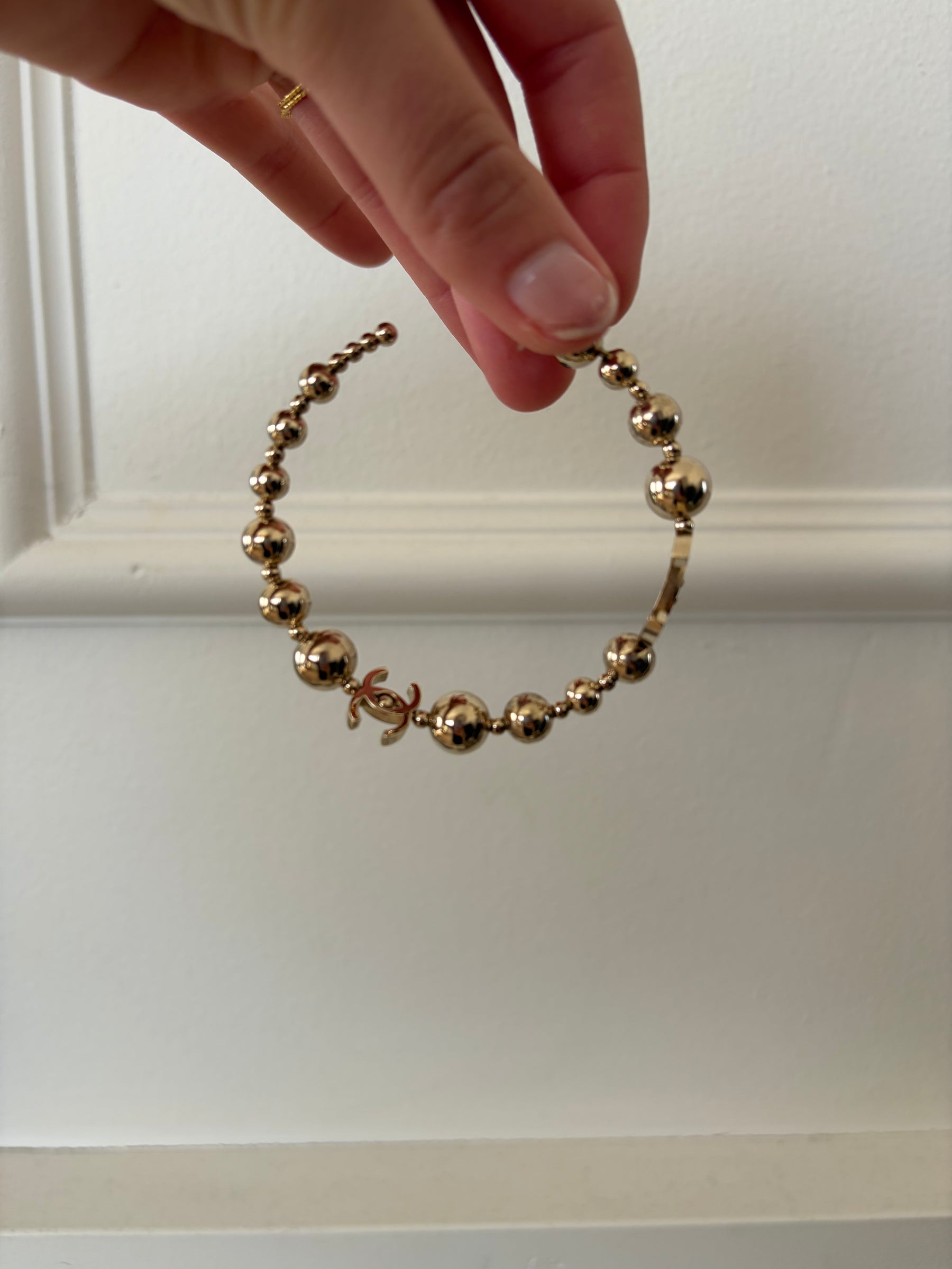 Chanel Gold Tone Ball Logo Hoops