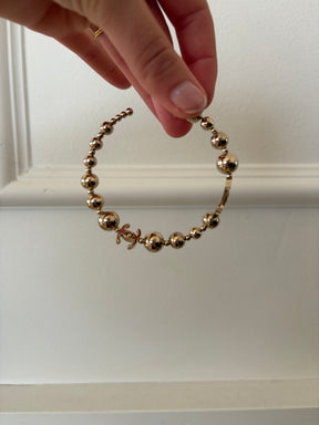 Chanel Gold Tone Ball Logo Hoops