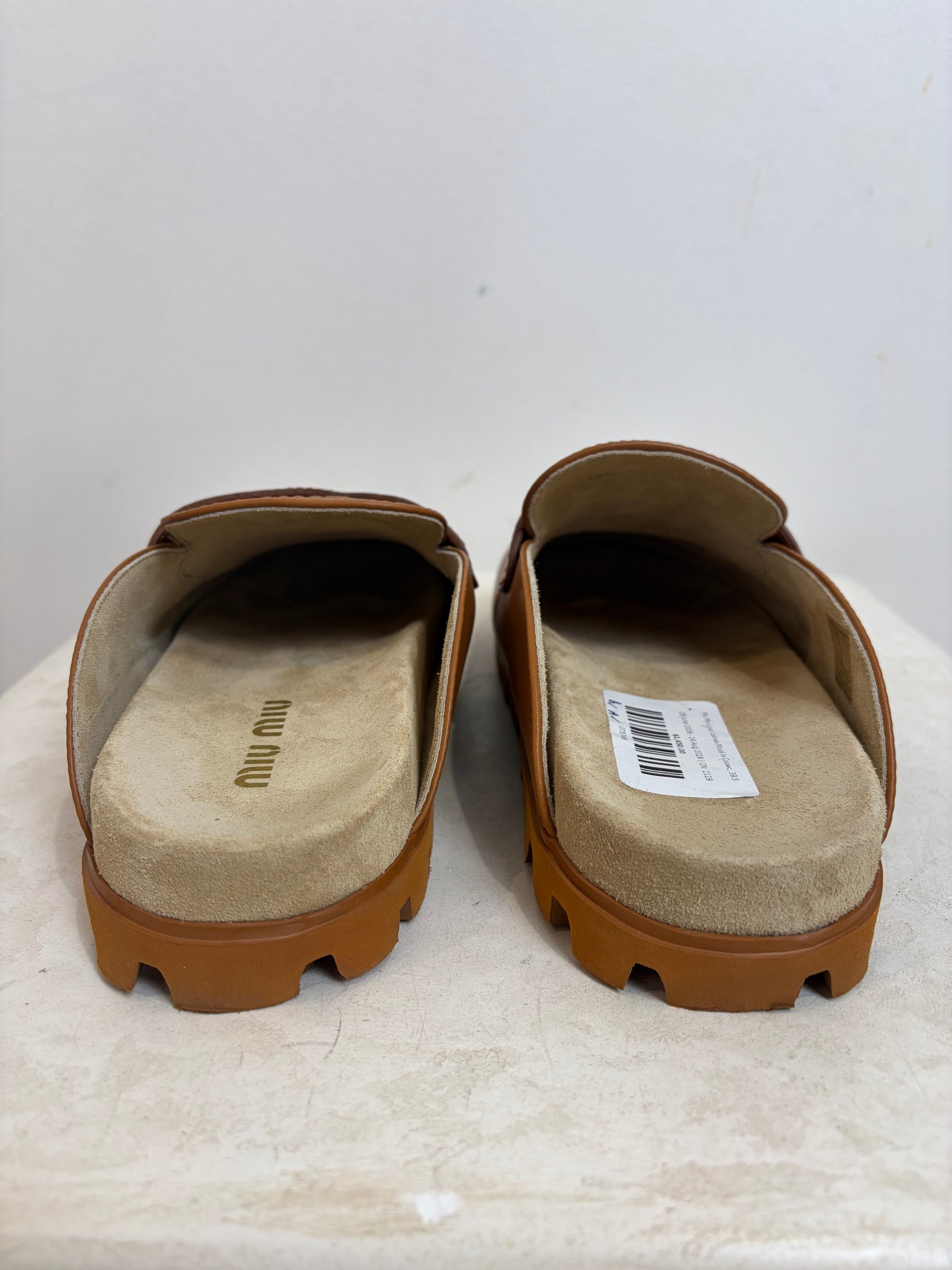 Miu Miu Logo Leather Mules In Cognac, 39.5