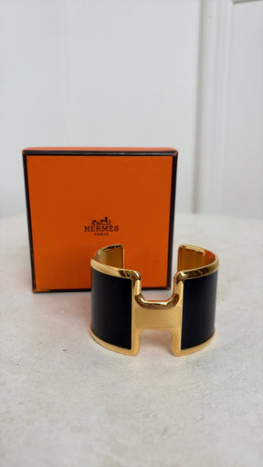 Hermès Black and Gold Leather Olympe cuff bracelet