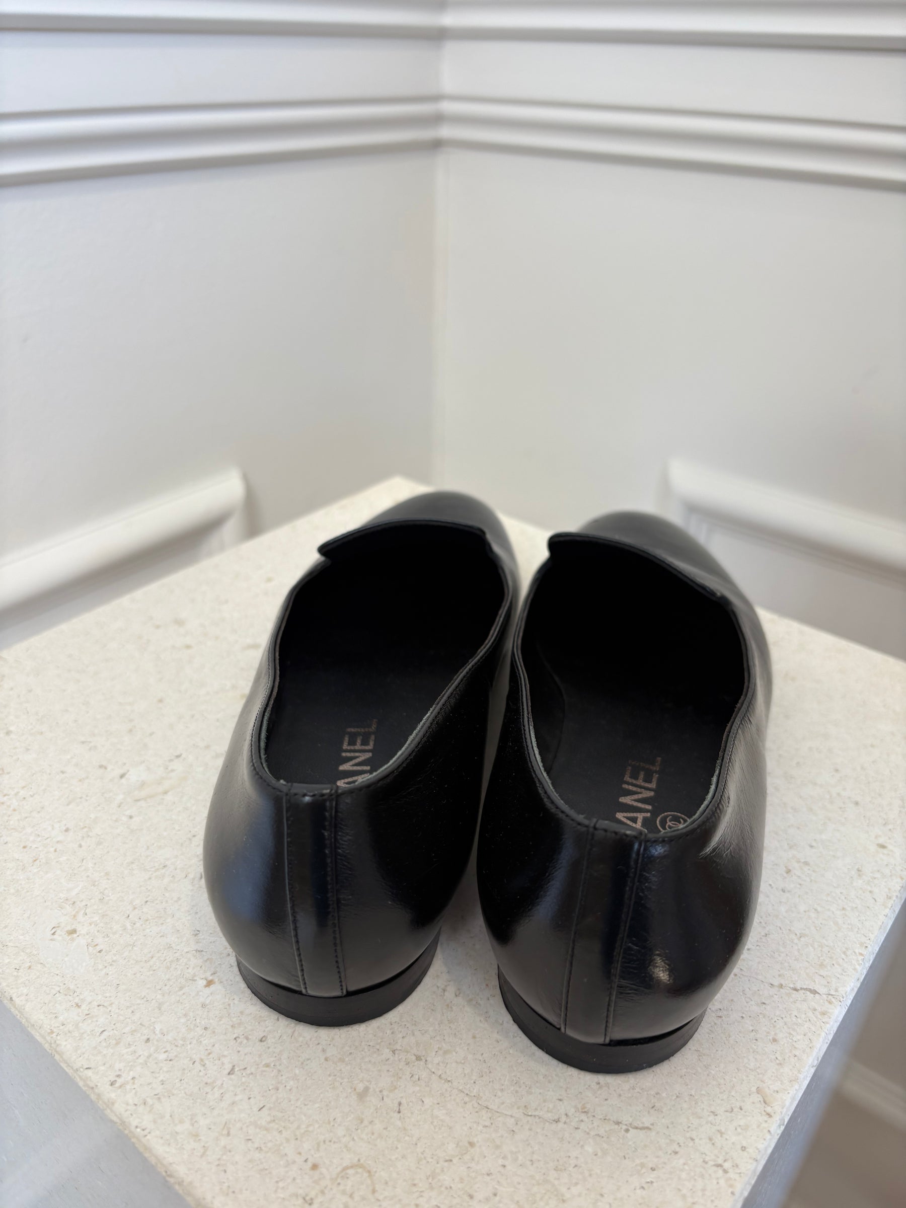 Chanel Black Leather Gunmetal Logo Flats, 36.5