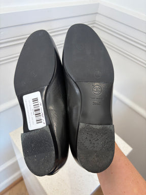 Chanel Black Leather Gunmetal Logo Flats, 36.5