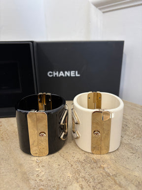 Chanel White and Black Acrylic Logo Cuff Set