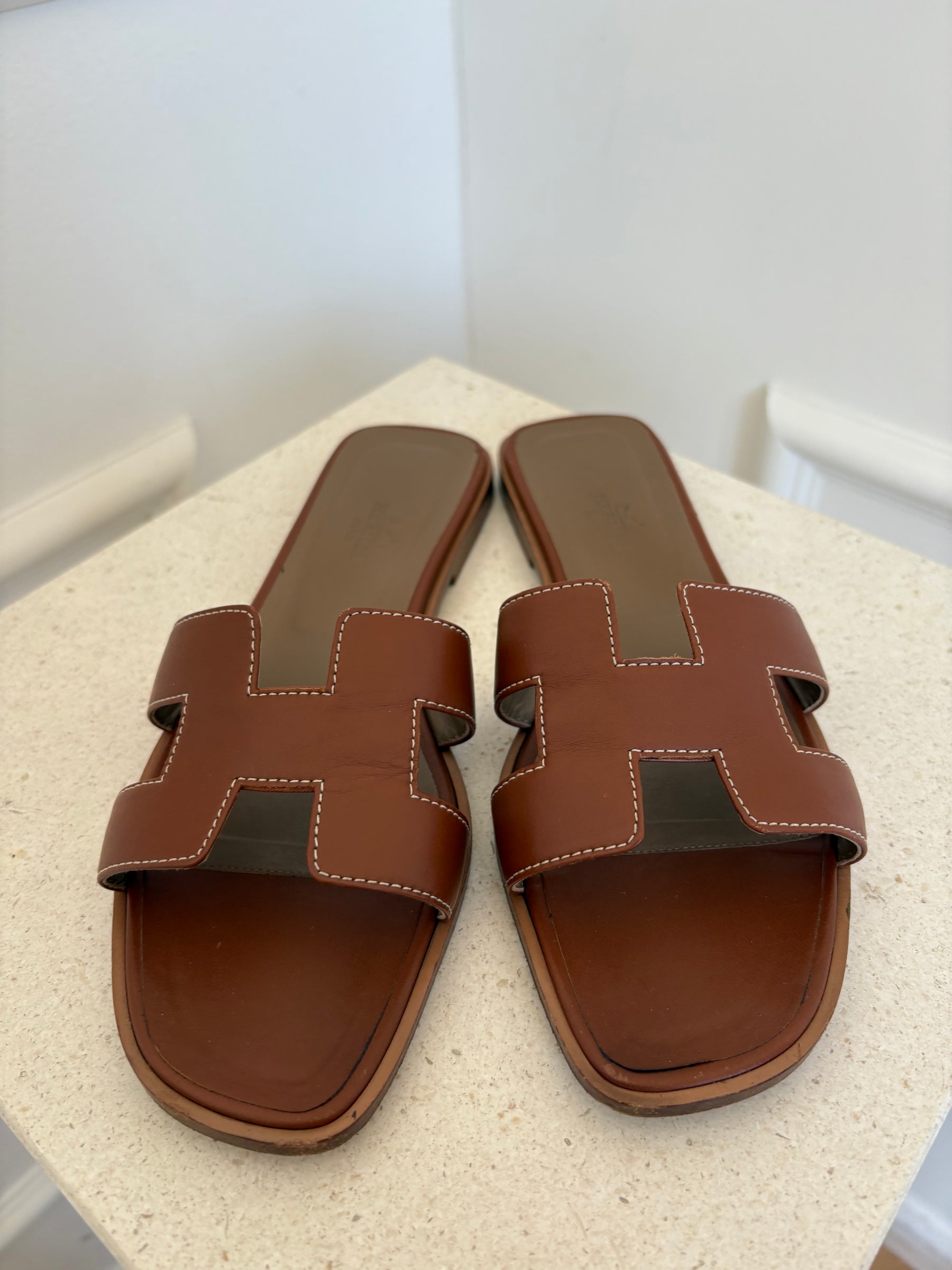 Hermès Gold Leather Oran Sandals, 38.5