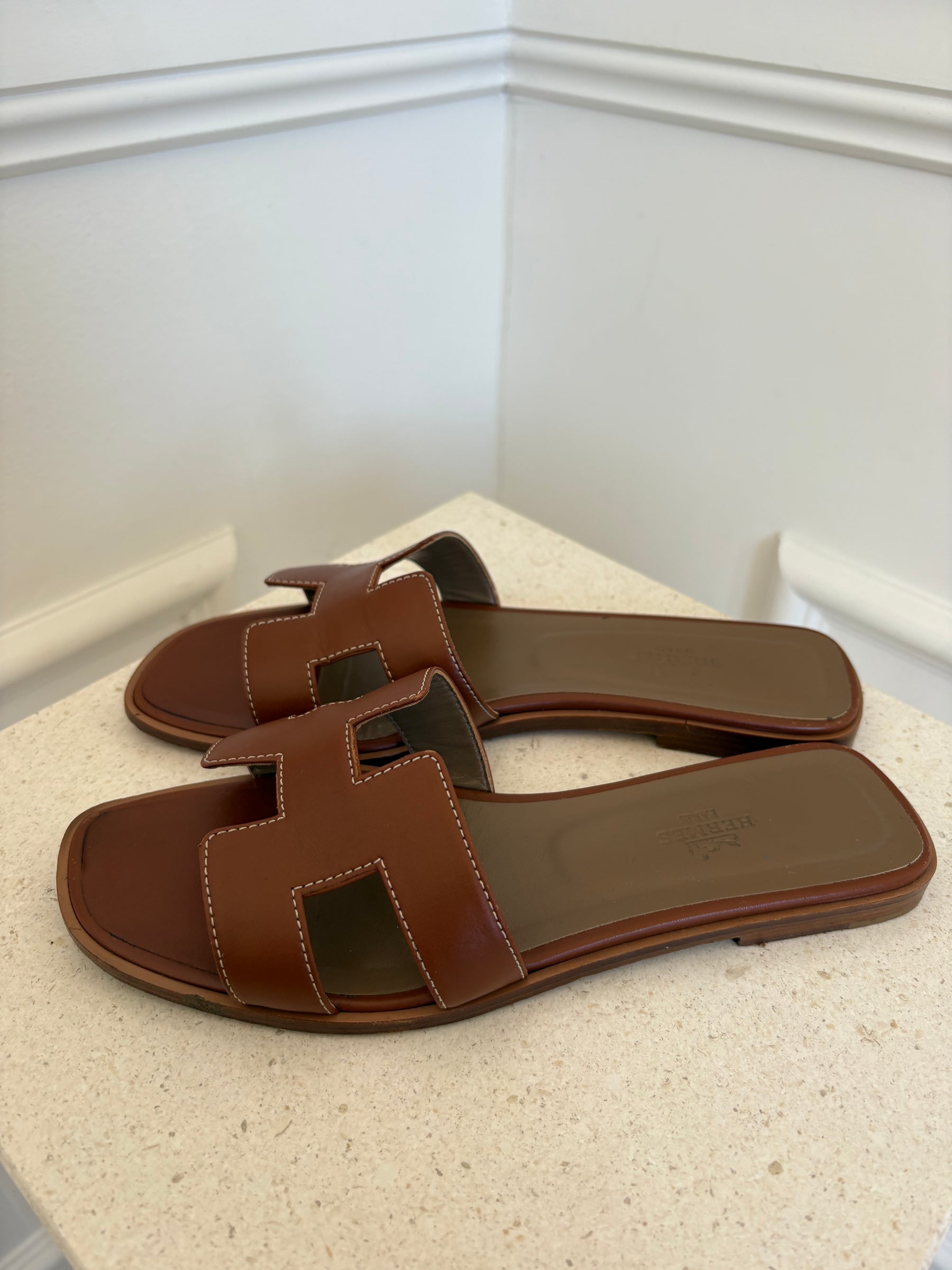 Hermès Gold Leather Oran Sandals, 38.5