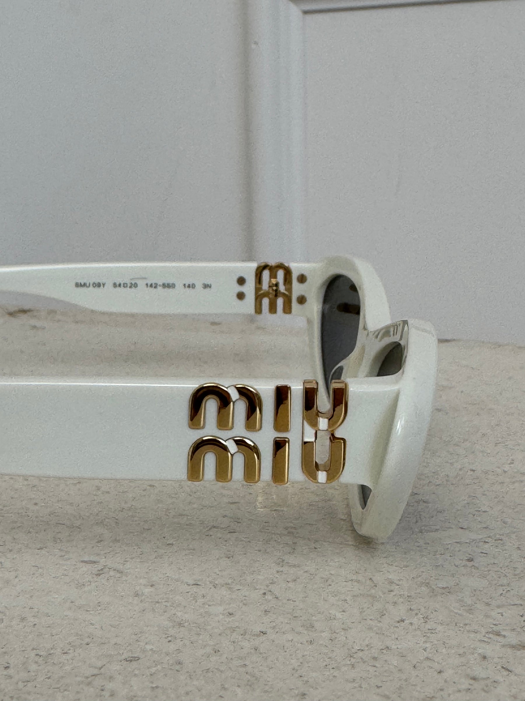 Miu Miu White Narrow Cat Eye Sunglasses