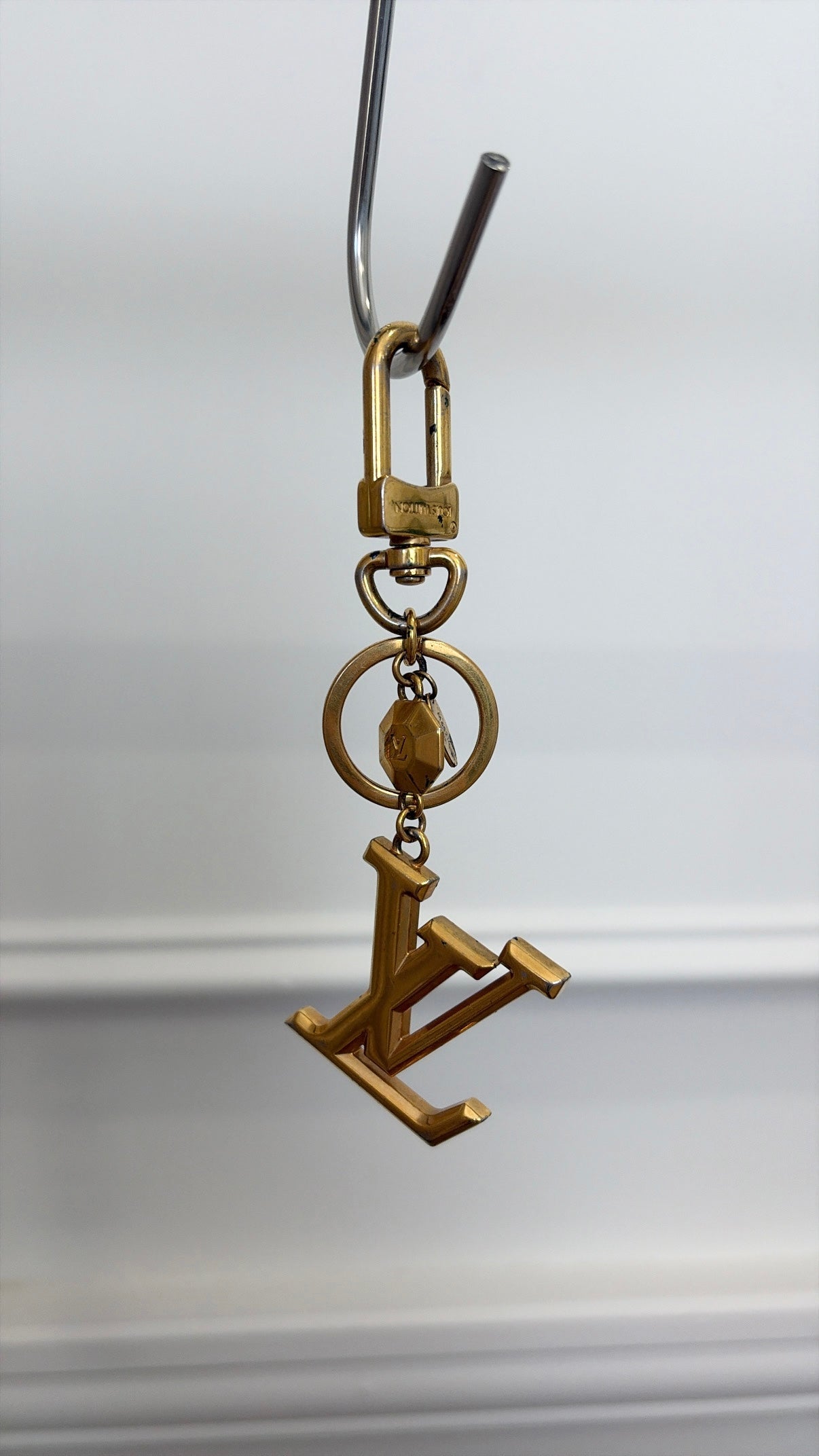 Louis Vuitton Gold Tone Logo Charm,