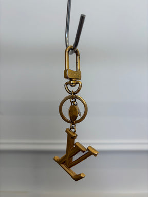 Louis Vuitton Gold Tone Logo Charm,