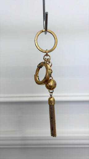 Louis Vuitton Gold Tone Logo Tassel Charm,