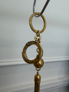 Louis Vuitton Gold Tone Logo Tassel Charm,