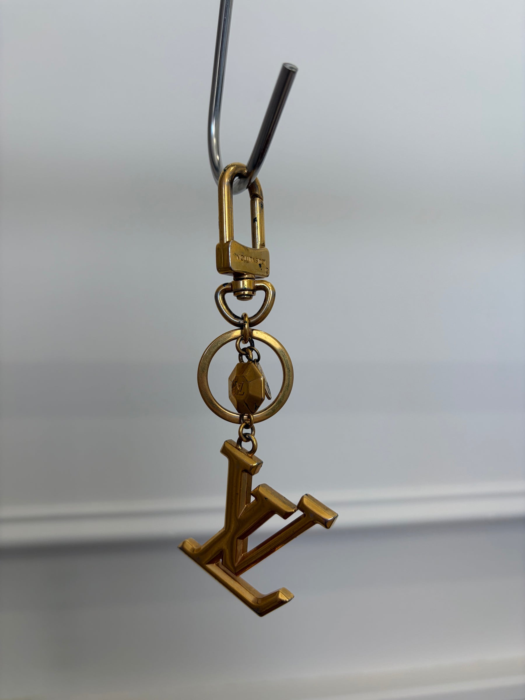 Louis Vuitton Gold Tone Logo Charm,